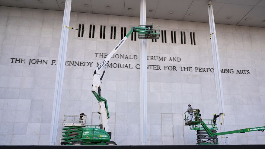 New signage, The Donald J. Trump and The John F. Kennedy Memorial Center for the Performing Arts, is unveiled on the Kennedy Center, Friday, Dec. 19, 2025, in Washington. (AP Photo/Jacquelyn Martin)
