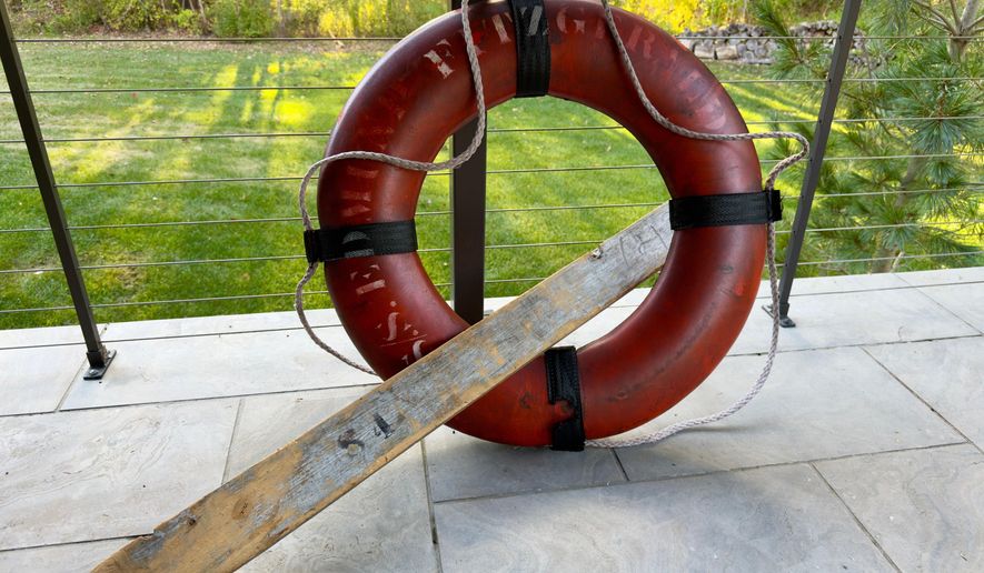 A rare life ring from the 1975 shipwreck of the Edmund Fitzgerald obtained by the state of Michigan in a lawsuit settlement is displayed on Oct. 12, 2025, outside Detroit. (Randal Smith via AP, File)