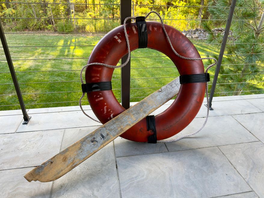 A rare life ring from the 1975 shipwreck of the Edmund Fitzgerald obtained by the state of Michigan in a lawsuit settlement is displayed on Oct. 12, 2025, outside Detroit. (Randal Smith via AP, File)