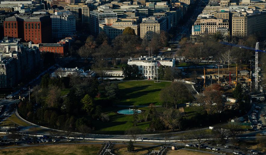 Work continues on the construction of the ballroom at the White House where the East Wing once stood, Tuesday, Dec. 16, 2025, in Washington. (AP Photo/Julia Demaree Nikhinson)