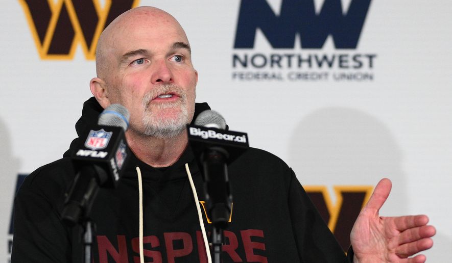Washington Commanders head coach Dan Quinn talks to the media during a news conference following an NFL football game against the Philadelphia Eagles, Saturday, Dec. 20, 2025, in Landover, Md. (AP Photo/Nick Wass)