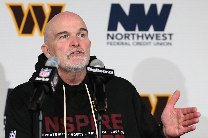 Washington Commanders head coach Dan Quinn talks to the media during a news conference following an NFL football game against the Philadelphia Eagles, Saturday, Dec. 20, 2025, in Landover, Md. (AP Photo/Nick Wass)