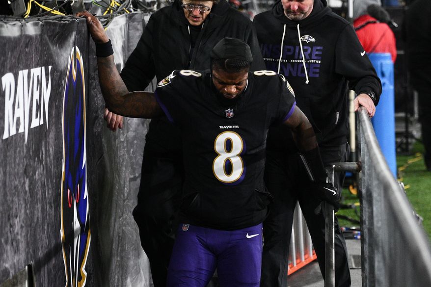 Baltimore Ravens quarterback Lamar Jackson (8) leaves the field during the first half of an NFL football game against the New England Patriots, Sunday, Dec. 21, 2025, in Baltimore. (AP Photo/Nick Wass)