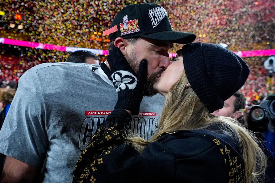 Kansas City Chiefs tight end Travis Kelce and Taylor Swift kiss after the AFC Championship NFL football game against the Buffalo Bills, in Kansas City, Mo., Jan. 26, 2025. (AP Photo/Ashley Landis, File)