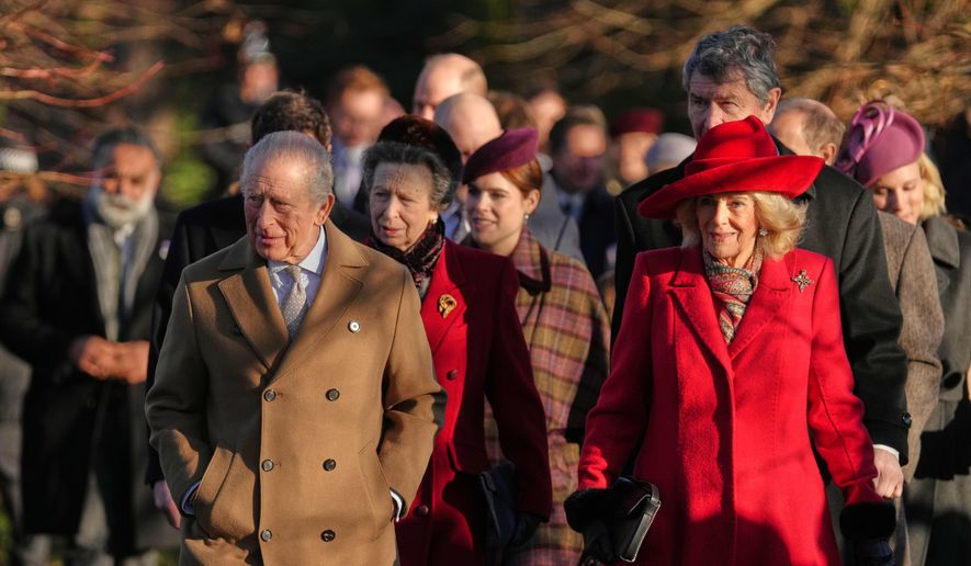Britain's King Charles III and Queen Camilla arrive to attend the Christmas Day service at St Mary Magdalene Church in Sandringham, Norfolk, England, Thursday, Dec. 25, 2025.(AP Photo/Jon Super)