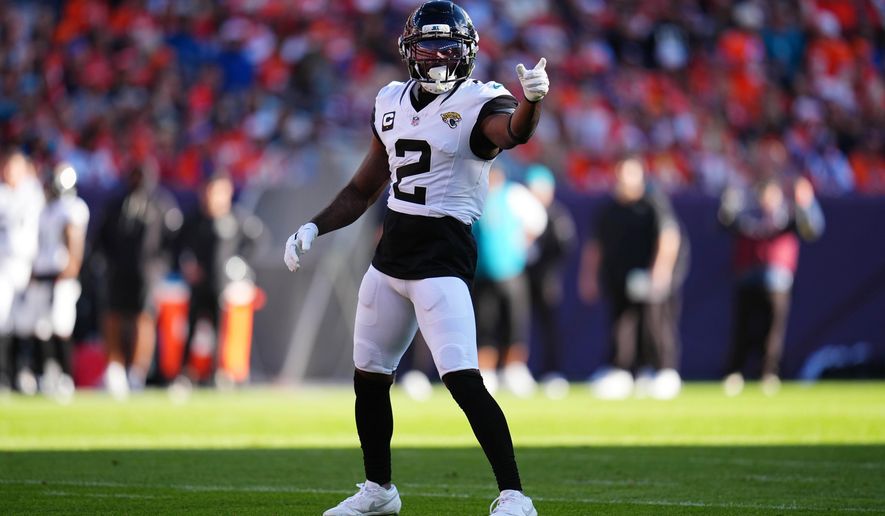 Jacksonville Jaguars cornerback Jourdan Lewis reacts during the first half of an NFL football game against the Denver Broncos in Denver, Sunday, Dec. 21, 2025. (AP Photo/Jack Dempsey)