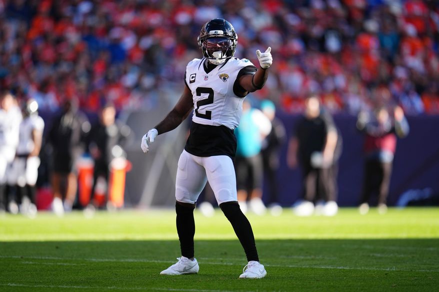 Jacksonville Jaguars cornerback Jourdan Lewis reacts during the first half of an NFL football game against the Denver Broncos in Denver, Sunday, Dec. 21, 2025. (AP Photo/Jack Dempsey)