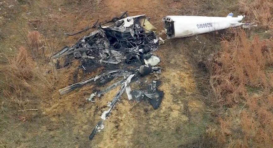 Debris from a helicopter is shown after two helicopters crashed in Hammonton, N.J., on Sunday, Dec. 28, 2025. (WPVI-TV/6ABC via AP)