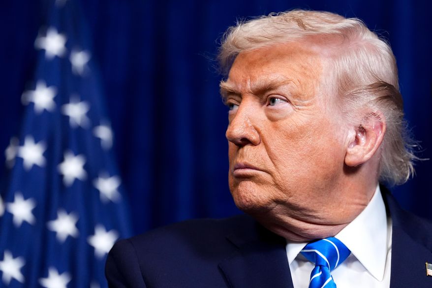 President Donald Trump attends a joint news conference with Ukraine's President Volodymyr Zelenskyy following a meeting at Trump's Mar-a-Lago club, Sunday, Dec. 28, 2025, in Palm Beach, Fla. (AP Photo/Alex Brandon)