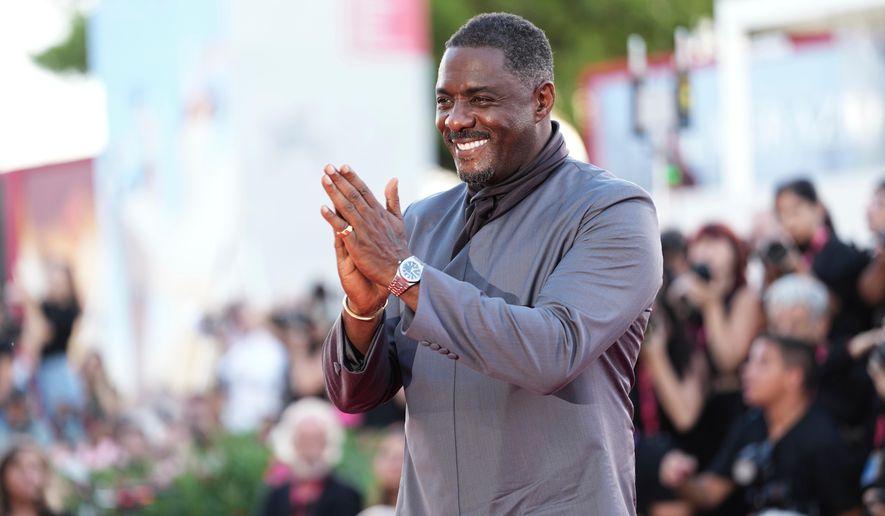 FILE - Idris Elba poses for photographers at the red carpet for the film 'A House of Dynamite' during the 82nd edition of the Venice Film Festival in Venice, Italy, on Tuesday, Sept. 2, 2025. (Photo by Scott A Garfitt/Invision/AP, File)