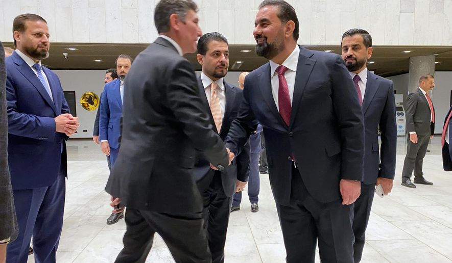 Members of the new Iraqi Parliament are seen before the start of their first legislative session in Baghdad, Iraq, Monday, Dec. 29, 2025. (AP Photo/Hadi Mizban)