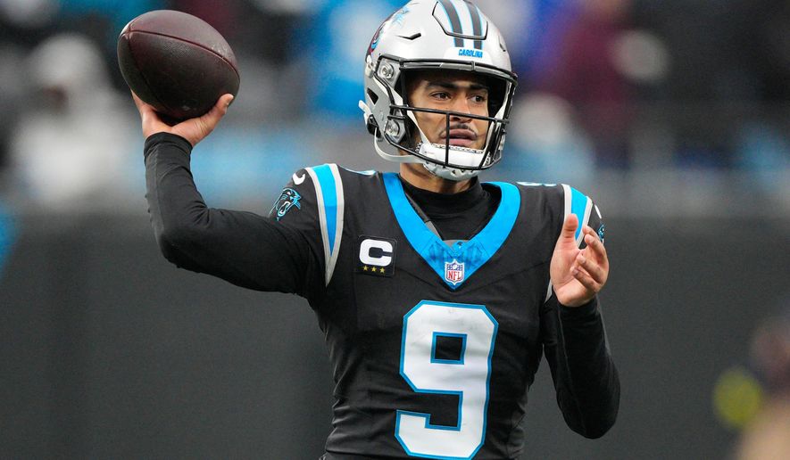 Carolina Panthers quarterback Bryce Young passes against the Seattle Seahawks during the second half of an NFL football game, Sunday, Dec. 28, 2025, in Charlotte, N.C. (AP Photo/Jacob Kupferman)