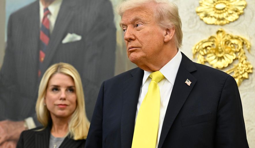 President Donald Trump and Attorney General Pam Bondi listen as FBI Director Kash Patel speaks during an event in the Oval Office at the White House, Oct. 15, 2025, in Washington. (AP Photo/John McDonnell, File)