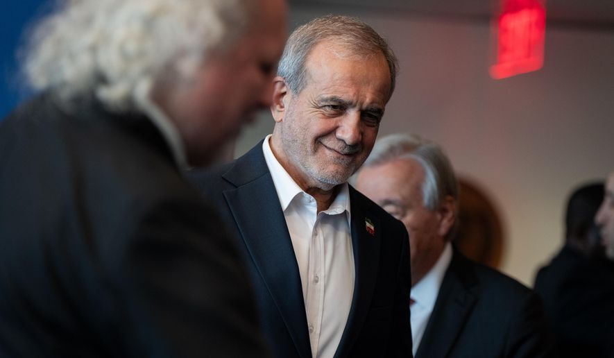 Masoud Pezeshkian, the President of Iran, attends the United Nations General Assembly at United Nations headquarters, on Sept. 25, 2025. (AP Photo/Angelina Katsanis, File)