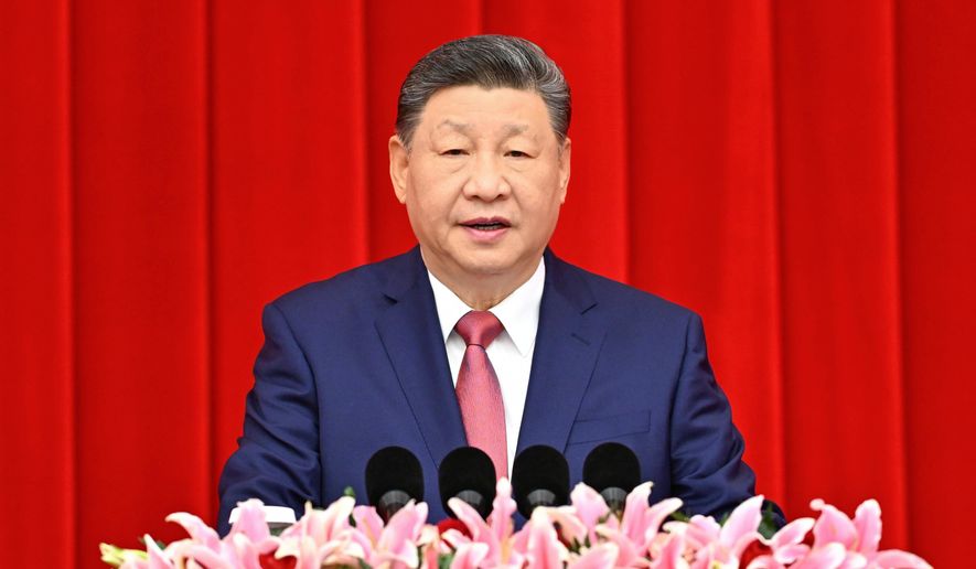 In this photo released by Xinhua News Agency, Chinese President Xi Jinping, also general secretary of the Communist Party of China Central Committee and chairman of the Central Military Commission, speaks at the New Year gathering held by the National Committee of the Chinese People's Political Consultative Conference (CPPCC) in Beijing on Wednesday, Dec. 31, 2025. (Yan Yan/Xinhua via AP)