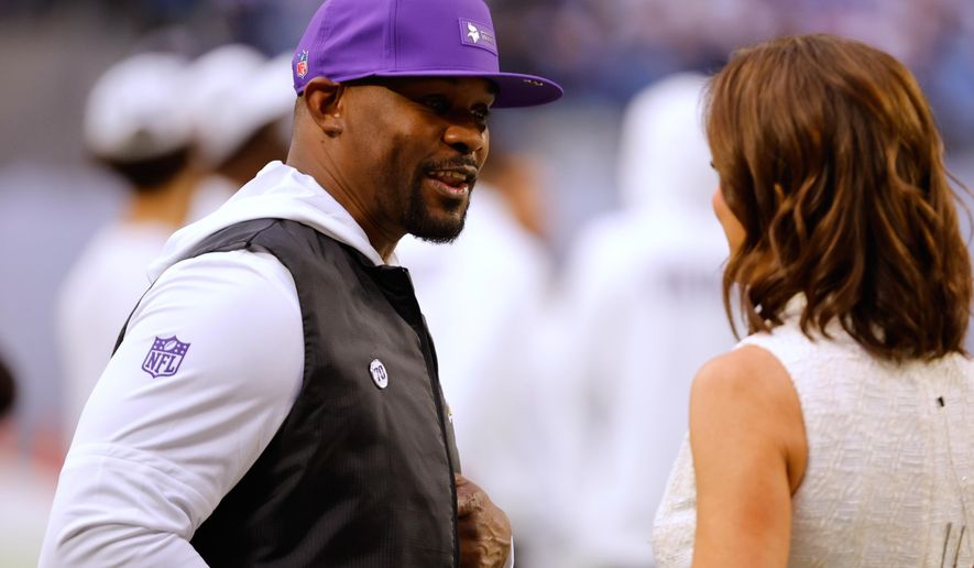 Minnesota Vikings defensive coordinator Brian Flores stands on the sideline before an NFL football game against the Detroit Lions, Thursday, Dec. 25, 2025, in Minneapolis. (AP Photo/Bruce Kluckhohn)