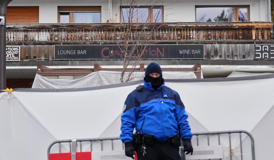 The sealed off Le Constellation bar, where a devastating fire left dead and injured during the New Year's celebrations, is seen in Crans-Montana, Swiss Alps, Switzerland, Friday morning, Jan. 2, 2026. (AP Photo/Antonio Calanni)