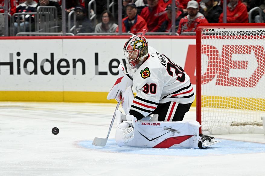 Chicago Blackhawks goalie Spencer Knight (30) making a save during the third period of an NHL game against the Washington Capitals at Capital One Arena in Washington D.C., January 3, 2026. (Photo for the Washington Times)