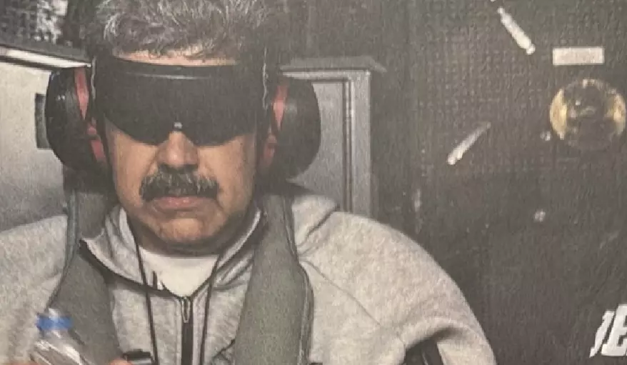 President Trump posts image of Nicolás Maduro aboard USS Iwo Jim via Truth Social.