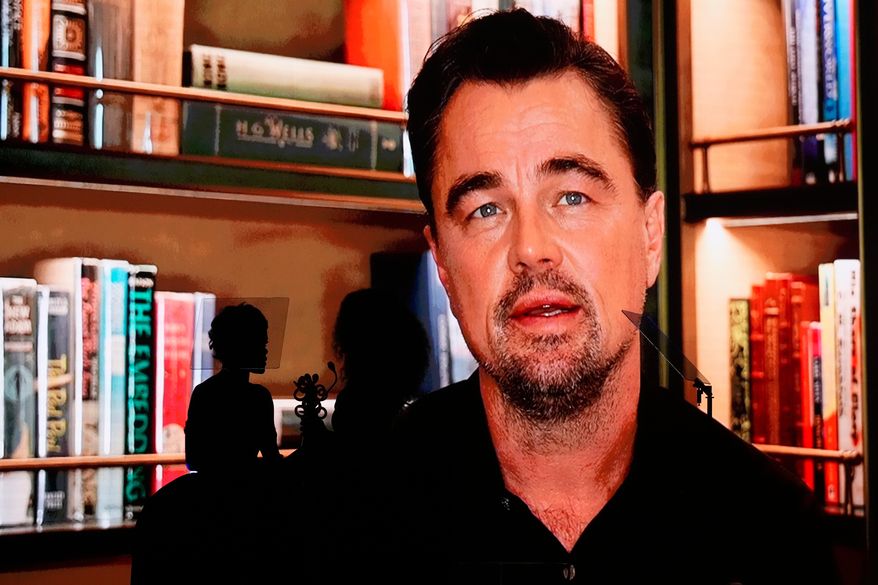 A video of Leonardo DiCaprio accepting the desert palm achievement award is shown during the 37th Palm Springs International Film Festival Film Awards on Saturday, Jan. 3, 2026 at Palm Springs Convention Center in Palm Springs, Calif. (AP Photo/Chris Pizzello)