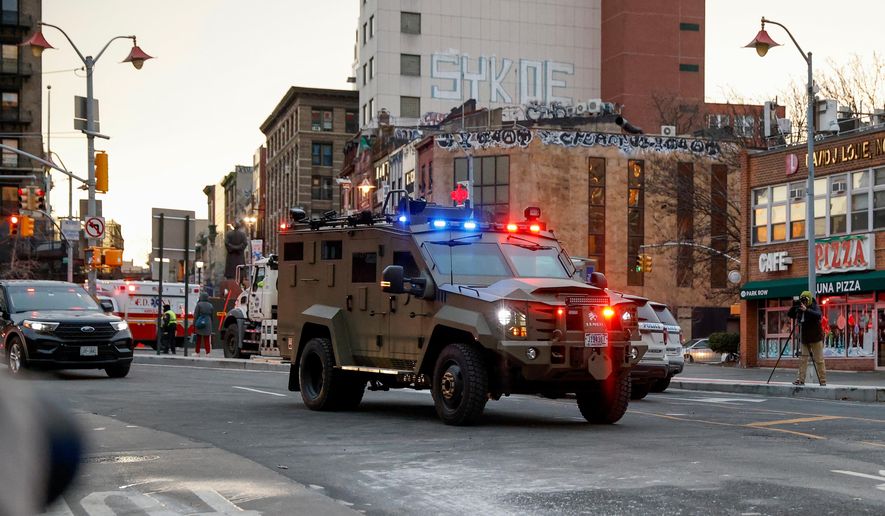 An armored vehicle carrying Venezuelan President Nicolas Maduro and his wife Cilia Flores arrives at Manhattan Federal Court, Monday, Jan. 5, 2026, in New York. (AP Photo/Stefan Jeremiah)