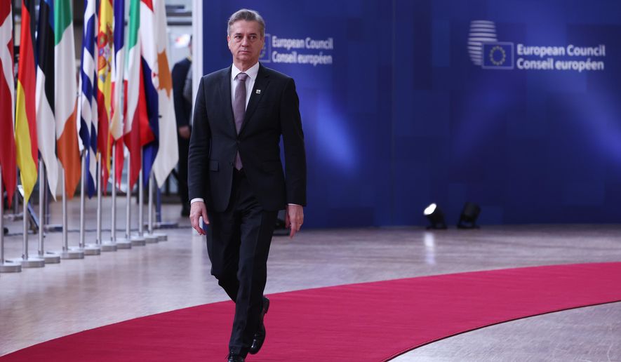 Slovenia's Prime Minister Robert Golob arrives for the EU Summit in Brussels, Thursday, Dec. 18, 2025. (AP Photo/Omar Havana)