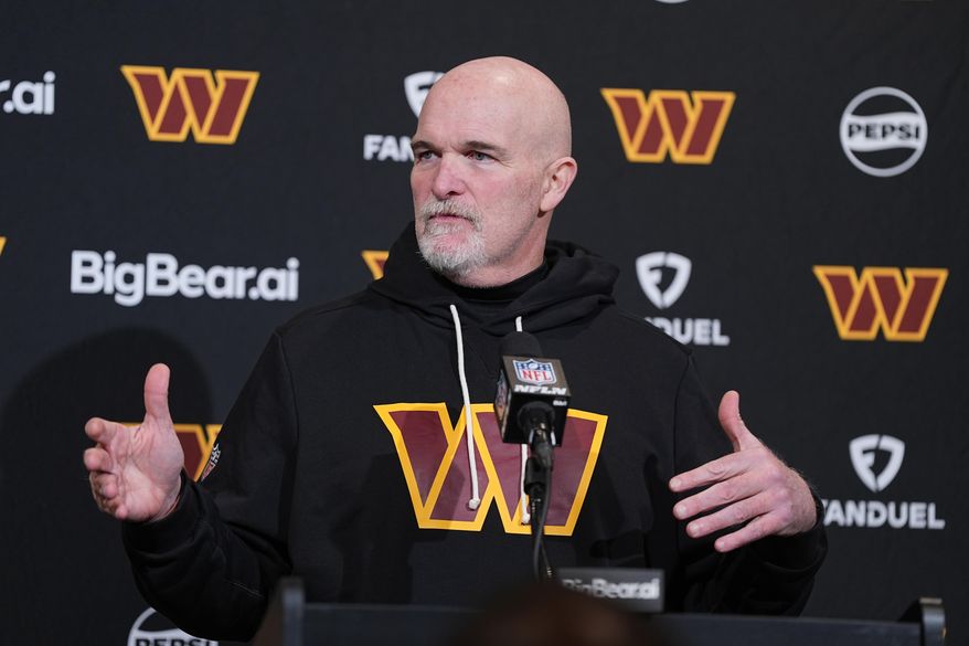 Washington Commanders head coach Dan Quinn speaks during a news conference after an NFL football game against the Philadelphia Eagles on Jan. 4, 2026, in Philadelphia. (AP Photo/Matt Rourke, File)