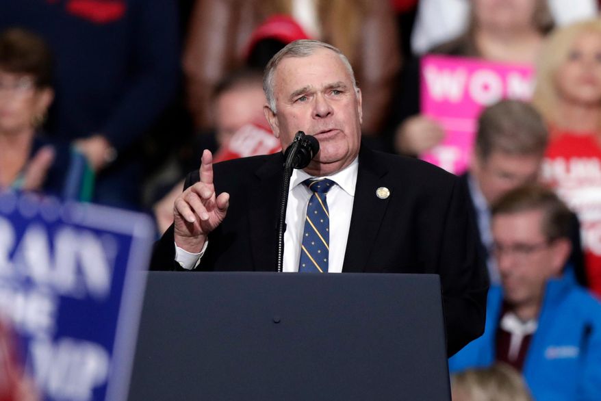 Indiana State Rep. Jim Baird, Republican candidate for Indiana's 4th Congressional District, speaks at a campaign rally featuring President Donald Trump in Indianapolis, Nov. 2, 2018. (AP Photo/Michael Conroy, File)