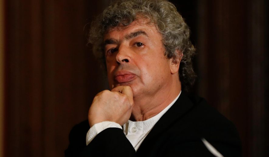 FILE - Semyon Bychkov meets with media after being appointed The Czech Philharmonic new chief conductor and music director at the Rudolfinum concert hall in Prague, Czech Republic, Monday, Oct. 16, 2017. (AP Photo/Petr David Josek, File)