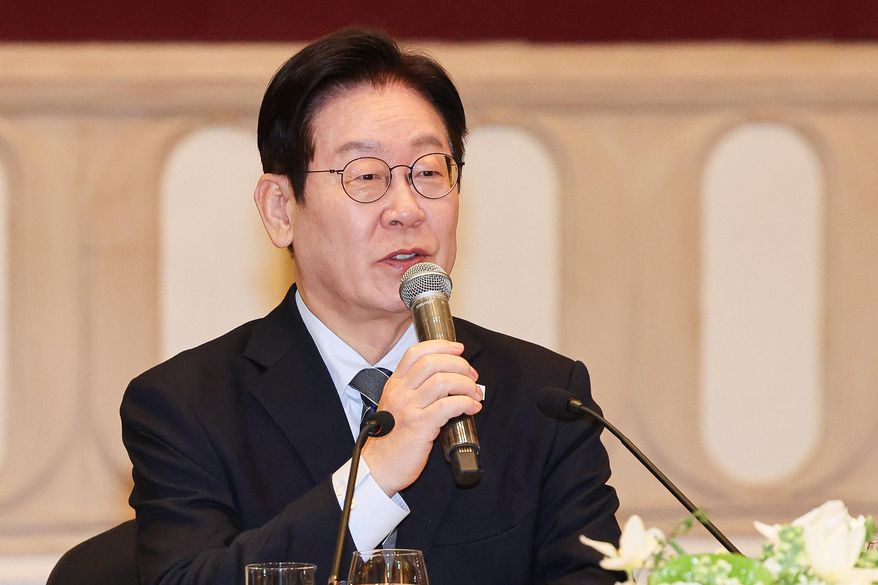South Korean President Lee Jae Myung speaks during a meeting with members of the South Korean media in Shanghai, China, Wednesday, Jan. 7, 2026. (Han Sang-kyun/Yonhap via AP) ** FILE **