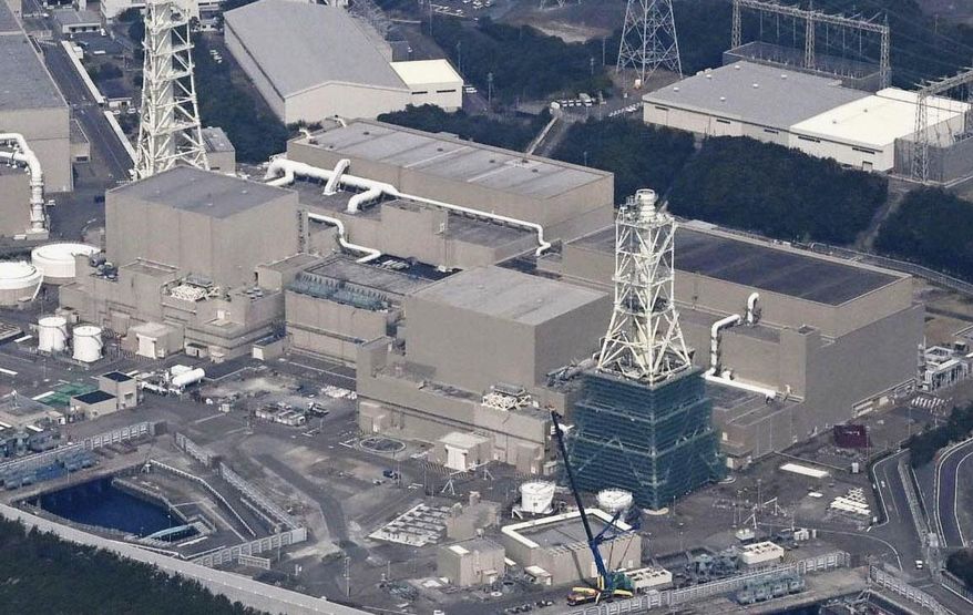 This aerial photo shows Hamaoka nuclear power plant, owned by the Cubu Electric Power Co., in Omaezaki, central Japan, March 26, 2025. (Minoru Iwasaki/Kyodo News via AP)