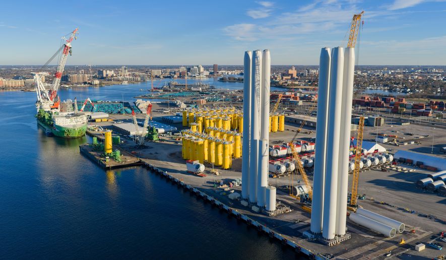 Wind turbine bases, generators and blades sit at The Portsmouth Marine terminal that is the staging area for Dominion Energy Virginia, which is developing Coastal Virginia Offshore Wind, Dec. 22, 2025, in Portsmouth, Va. (AP Photo/Steve Helber, File)