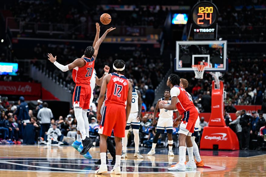 Washington Wizards forward Alex Sarr (20) jumps for the game’s opening tip-off against the Minnesota Timberwolves at Capital One Arena, Washington, D.C., January 4, 2026. (Photo by Brian Murphy for the Washington Times)