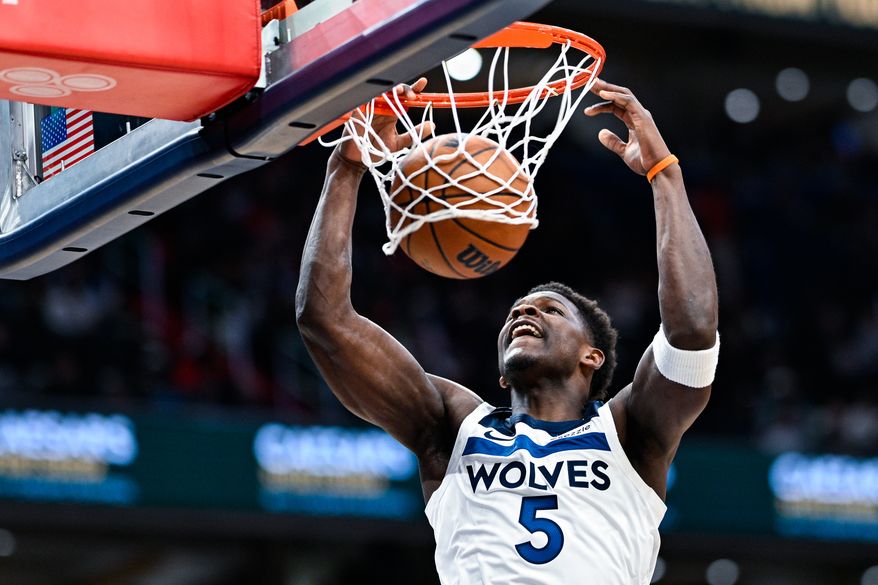 Minnesota Timberwolves guard Anthony Edwards (5) dunks the ball with authority against the Washington Wizards at Capital One Arena, Washington, D.C., January 4, 2026. (Photo by Brian Murphy for the Washington Times)