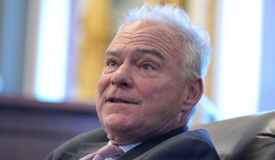 Sen. Tim Kaine, D-Va., speaks to reporters about a war powers resolution regarding Venezuela on Capitol Hill, Wednesday, Jan. 7, 2026, in Washington. (AP Photo/Mariam Zuhaib)