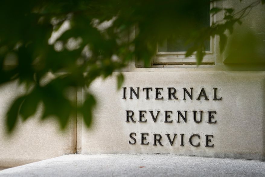 A sign is displayed outside the Internal Revenue Service building May 4, 2021, in Washington. (AP Photo/Patrick Semansky, File)