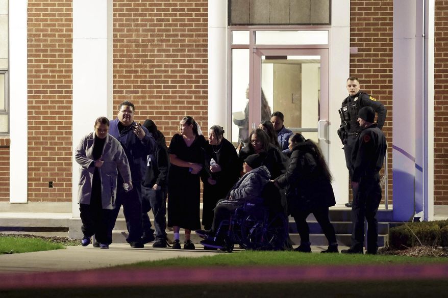 Funeral attendees leave a meetinghouse of The Church of Jesus Christ of Latter-day Saints after a fatal shooting in the parking lot in Salt Lake City on Wednesday, Jan. 7, 2025. (Laura Seitz/The Deseret News via AP)