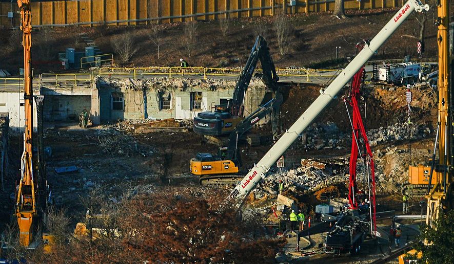 Work continues on the construction of the ballroom at the White House where the East Wing once stood, Tuesday, Dec. 16, 2025, in Washington. (AP Photo/Julia Demaree Nikhinson)