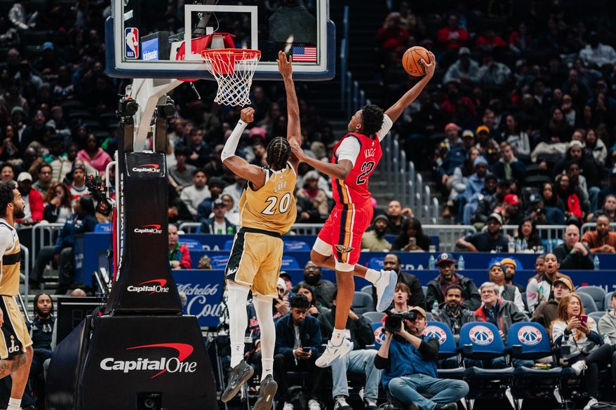 New Orlean Pelicans Center Derik Queen (22) attempts dunk over Washington Wizards Center Alex Sarr (20) at Capital One Arena, Washington, D.C., January 9th, 2026. Washington Wizards fall to the New Orleans Pelicans 128-107. (Photo by Jordan Sabillo, for the Washington Times)
