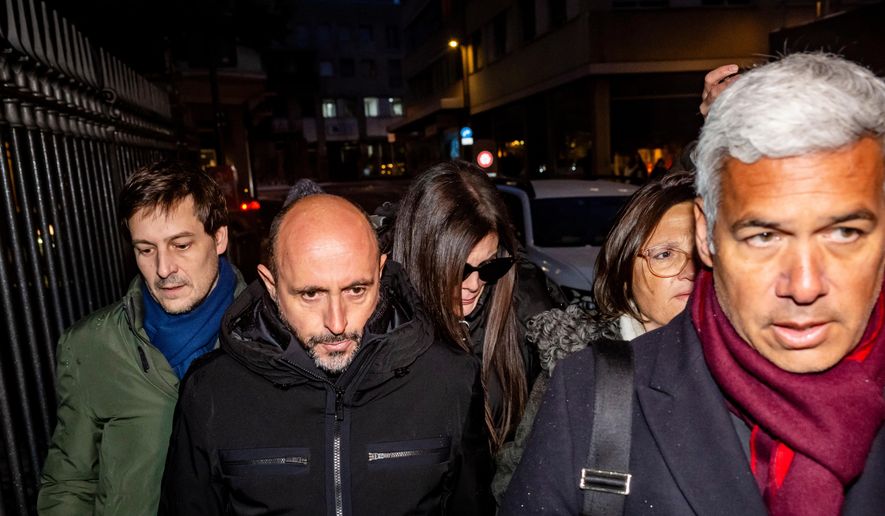 The owners of the "Le Constellation" bar in Crans-Montana, where the deadly fire happened on New Year's Day, Jacques und Jessica Moretti from France, center, arrive with their lawyers Patrick Michod, Yael Hayat and Nicola Meier, to be auditioned by the Valais public prosecutor's office in Sion, Switzerland, Friday, January 9, 2026. (Jean-Christophe Bott/Keystone via AP)