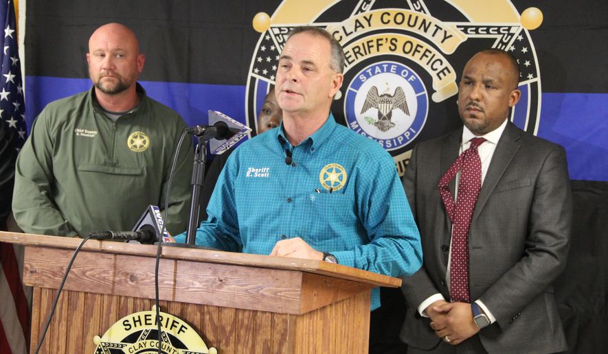 Clay County Sheriff Eddie Scott speaks during a news conference in West Point, Miss., on Saturday, Jan. 10, 2026, accompanied by Chief Deputy Steven "Woody" Woodruff, left, and Clay County District Attorney Scott Colom, right, after Friday night shootings at three locations. (Braden Simmons/The Commercial Dispatch via AP)