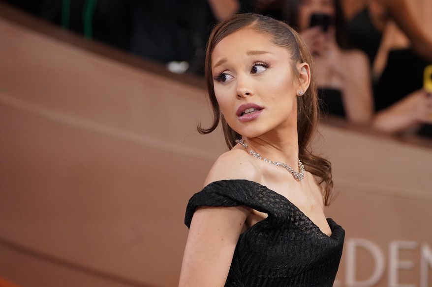 Ariana Grande arrives at the 83rd Golden Globes on Sunday, Jan. 11, 2026, at the Beverly Hilton in Beverly Hills, Calif. (Photo by Jordan Strauss/Invision/AP)