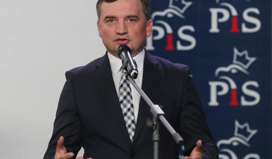 The leader of the Polish junior coalition partners Zbigniew Ziobro, speaks to reporters alongside in Warsaw, Poland, Saturday, Sept. 26, 2020. (AP Photo/Czarek Sokolowski, file)