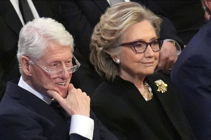 Former President Bill Clinton and former Secretary of State Hillary Clinton listen during the state funeral for former President Jimmy Carter at Washington National Cathedral in Washington, Jan. 9, 2025. (AP Photo/Jacquelyn Martin) **FILE**