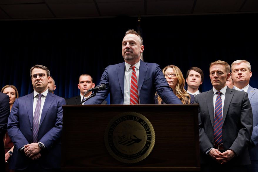 FILE - Assistant U.S. Attorney Joseph Thompson, center, answers questions during a news conference at the Minneapolis federal courthouse on March 19, 2025, in Minneapolis. (Kerem Yücel/Minnesota Public Radio via AP, file)