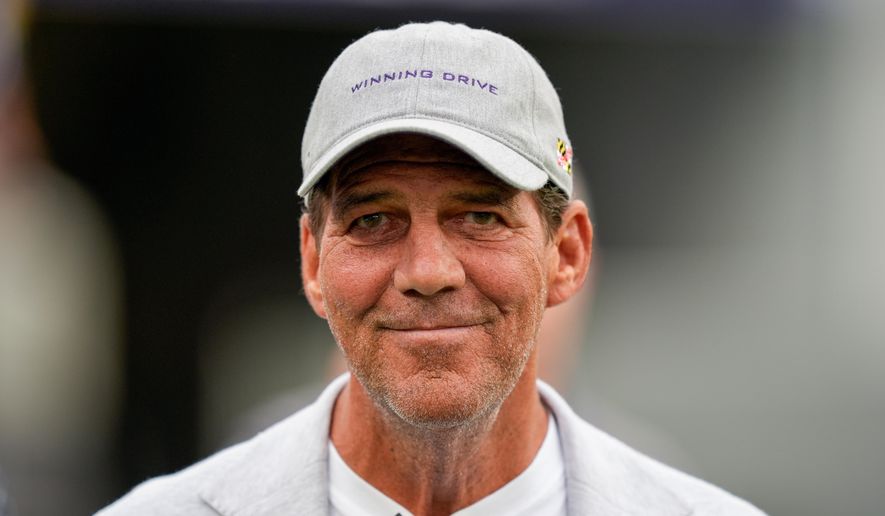 FILE - Baltimore Ravens owner Steve Bisciotti walks on the field prior to an NFL preseason football game against the Indianapolis Colts Thursday, Aug. 7, 2025, in Baltimore. (AP Photo/Alex Brandon,File)