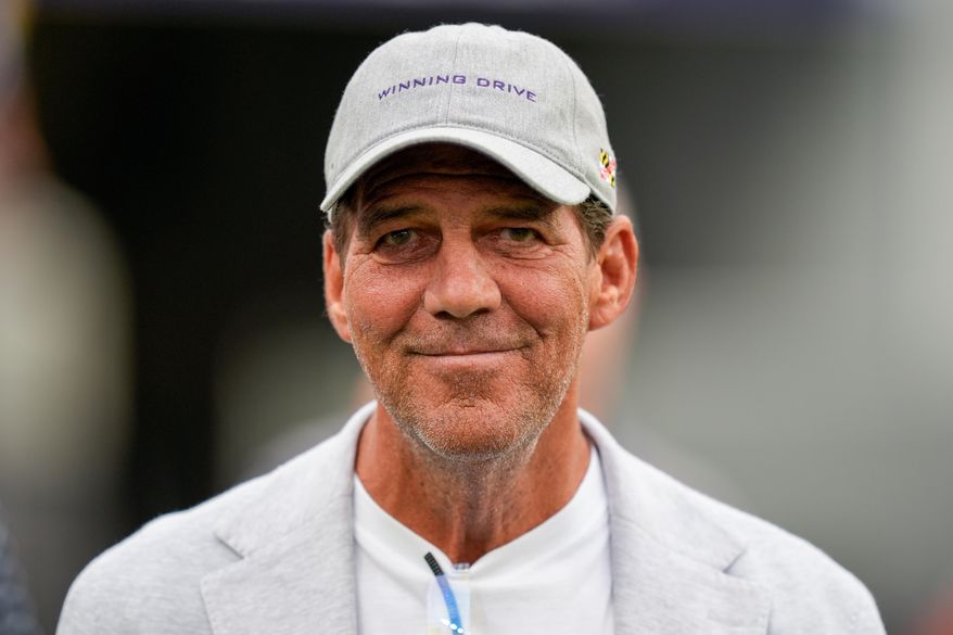 FILE - Baltimore Ravens owner Steve Bisciotti walks on the field prior to an NFL preseason football game against the Indianapolis Colts Thursday, Aug. 7, 2025, in Baltimore. (AP Photo/Alex Brandon,File)