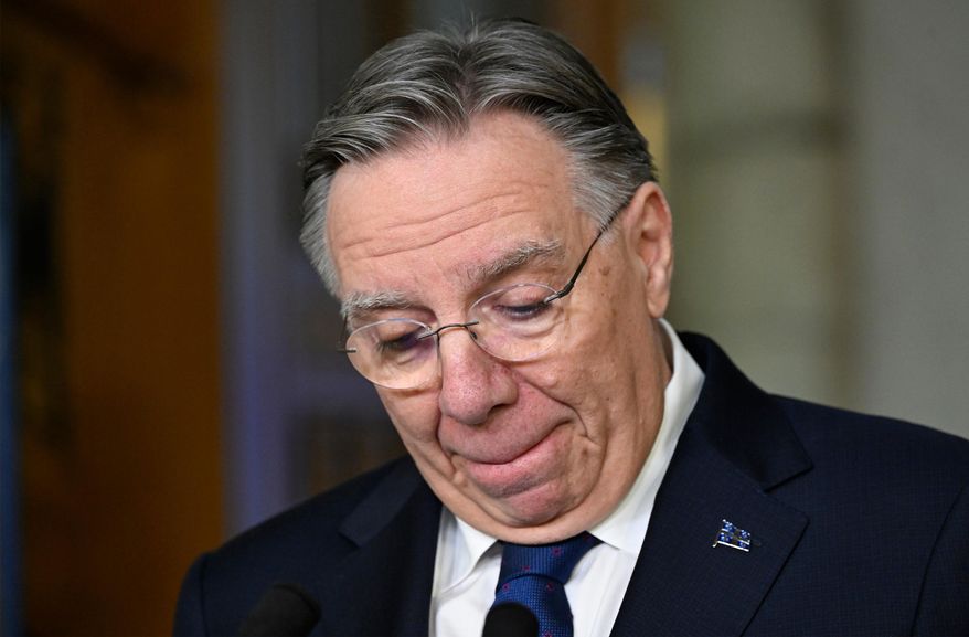 Quebec Premier Francois Legault announces his resignation during a news conference at his office in Quebec City, on Wednesday, Jan. 14, 2026. (Jacques Boissinot/The Canadian Press via AP)