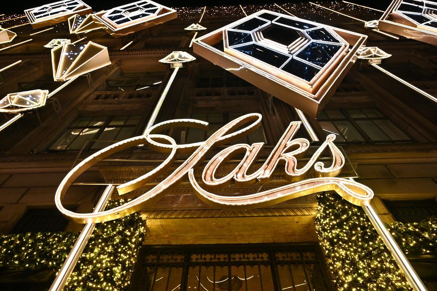Saks Fifth Avenue holiday light show and window reveal on Monday, Nov. 24, 2025, in New York. (Photo by Evan Agostini/Invision/AP, File)