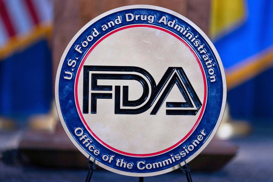 The Food and Drug Administration seal is seen at the Hubert Humphrey Building Auditorium in Washington, April 22, 2025. (AP Photo/Jose Luis Magana, File)